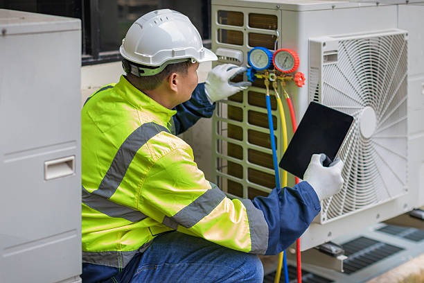 Professional Hvac technician working in Parkton, NC